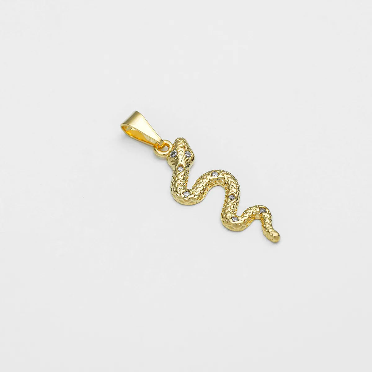 DIJE SERPIENTE VERDE-CRISTAL